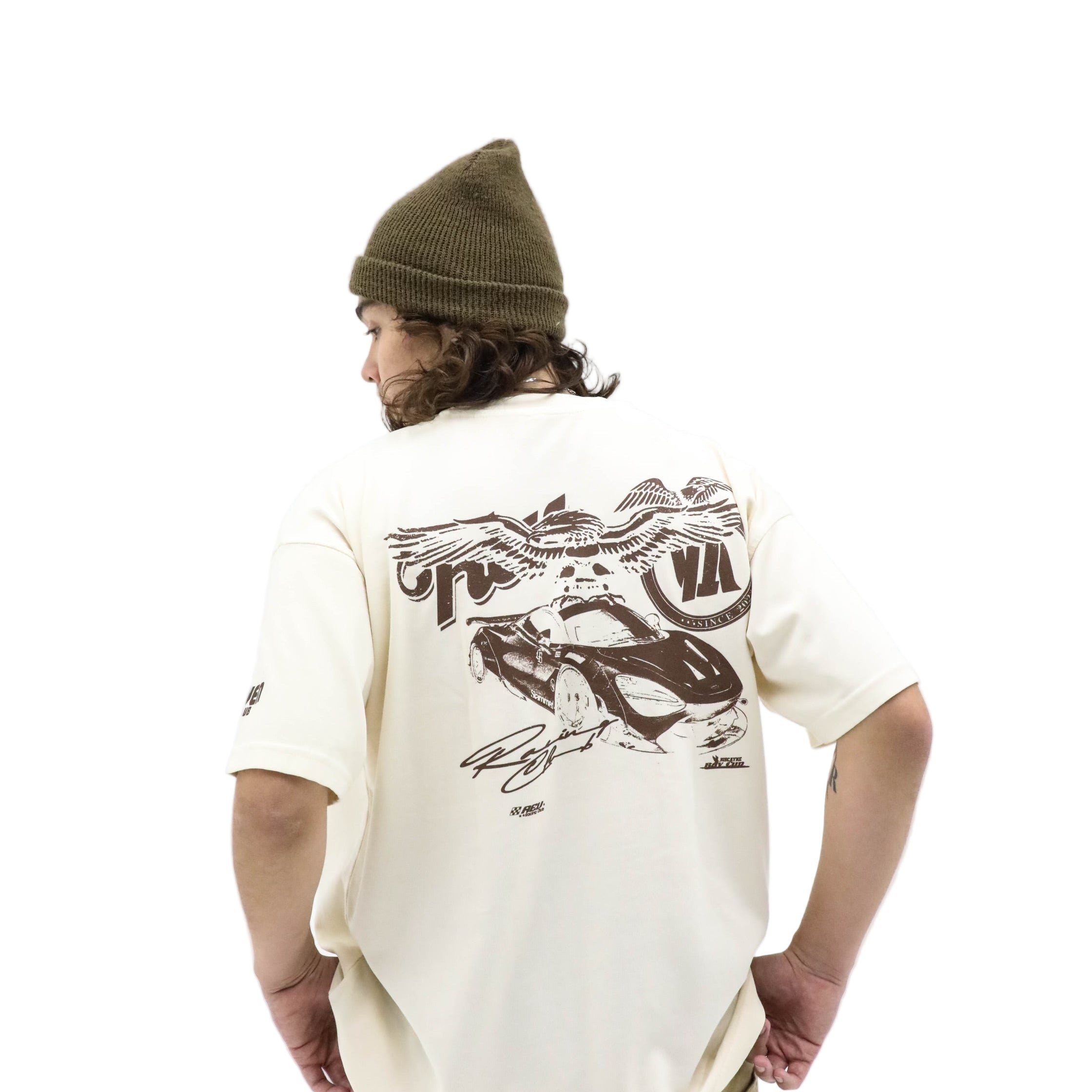 Person wearing a white t-shirt with a graphic design on the back, standing against a white background.
